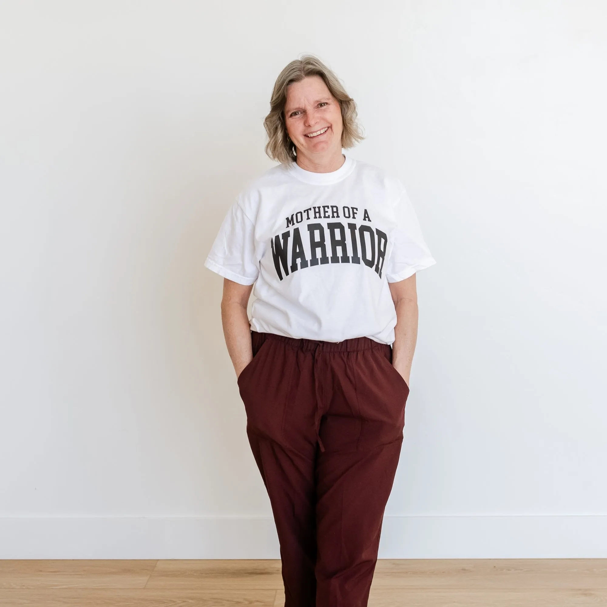 Mother of a Warrior - Varsity - SHORT SLEEVE COMFORT COLORS TEE